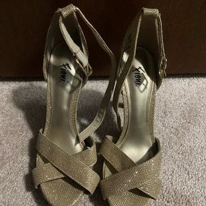 Gold high heels